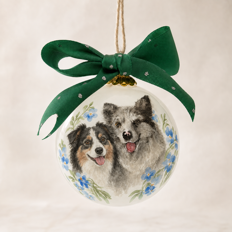 Two-pet inside-painted glass ornament created from separate reference photos