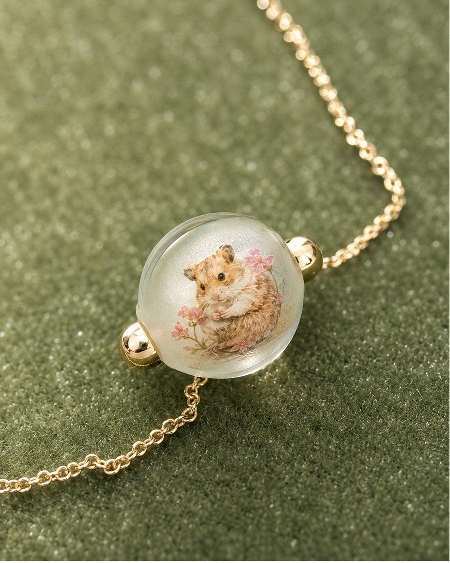 Custom hamster portrait necklace painted inside glass as a small pet memorial keepsake