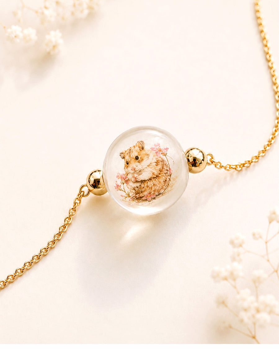 Inside-painted pet portrait necklace bead shown as one custom memorial keepsake option