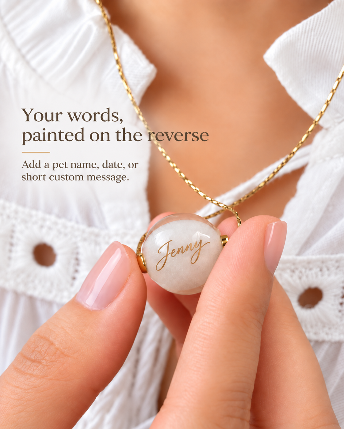 Reverse of a dog portrait glass bead necklace with the name Jenny