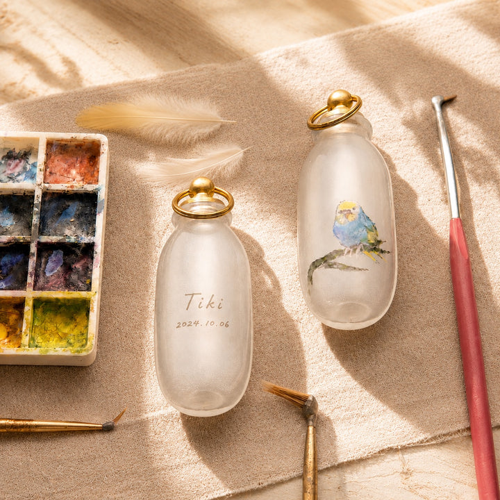 Custom hand-painted feather and fur keepsake