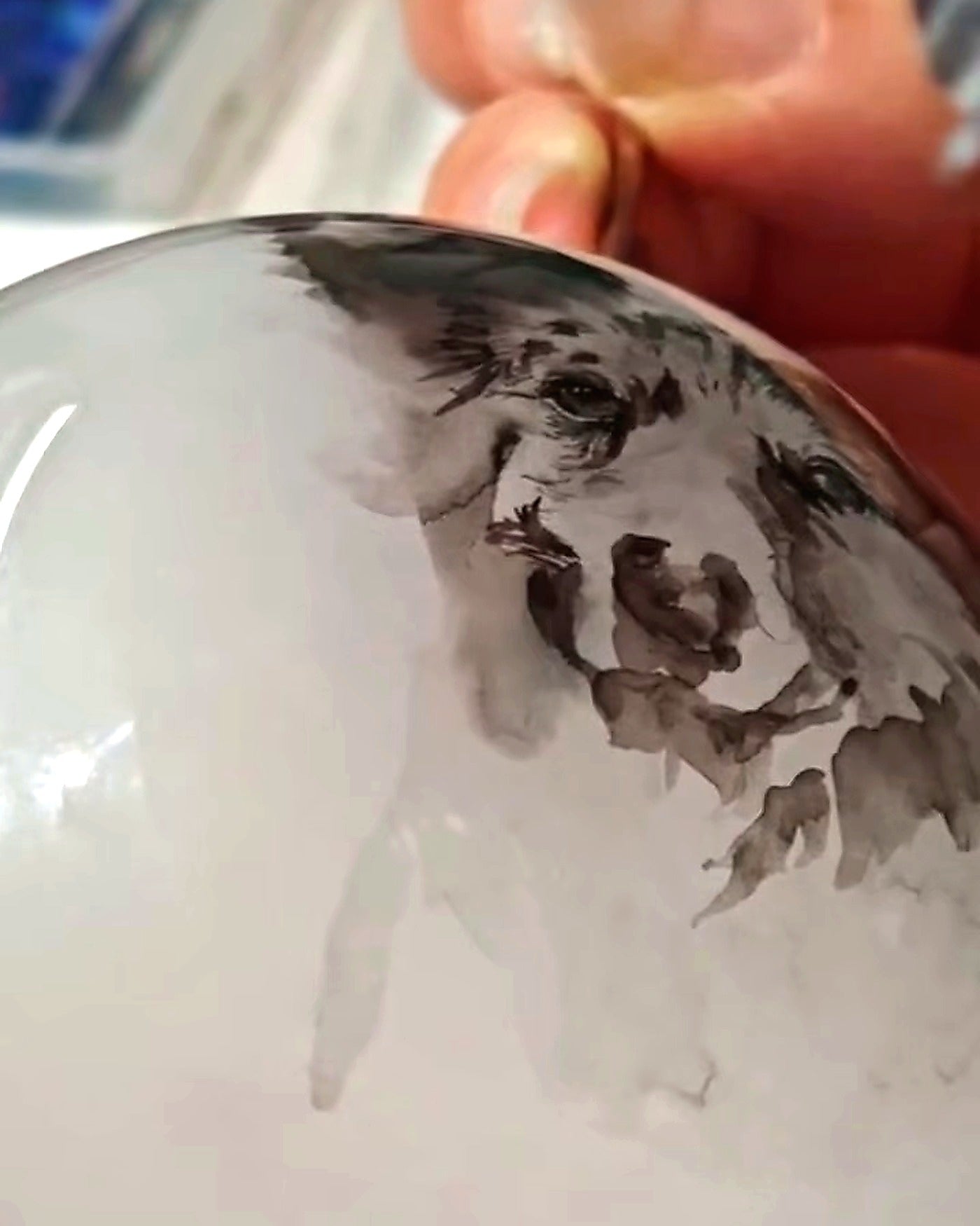 Personalized pet portrait ornament displayed as a holiday keepsake